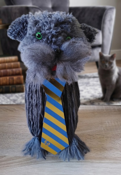 Geschenkbox Katze mit einer kl.Sektflasche